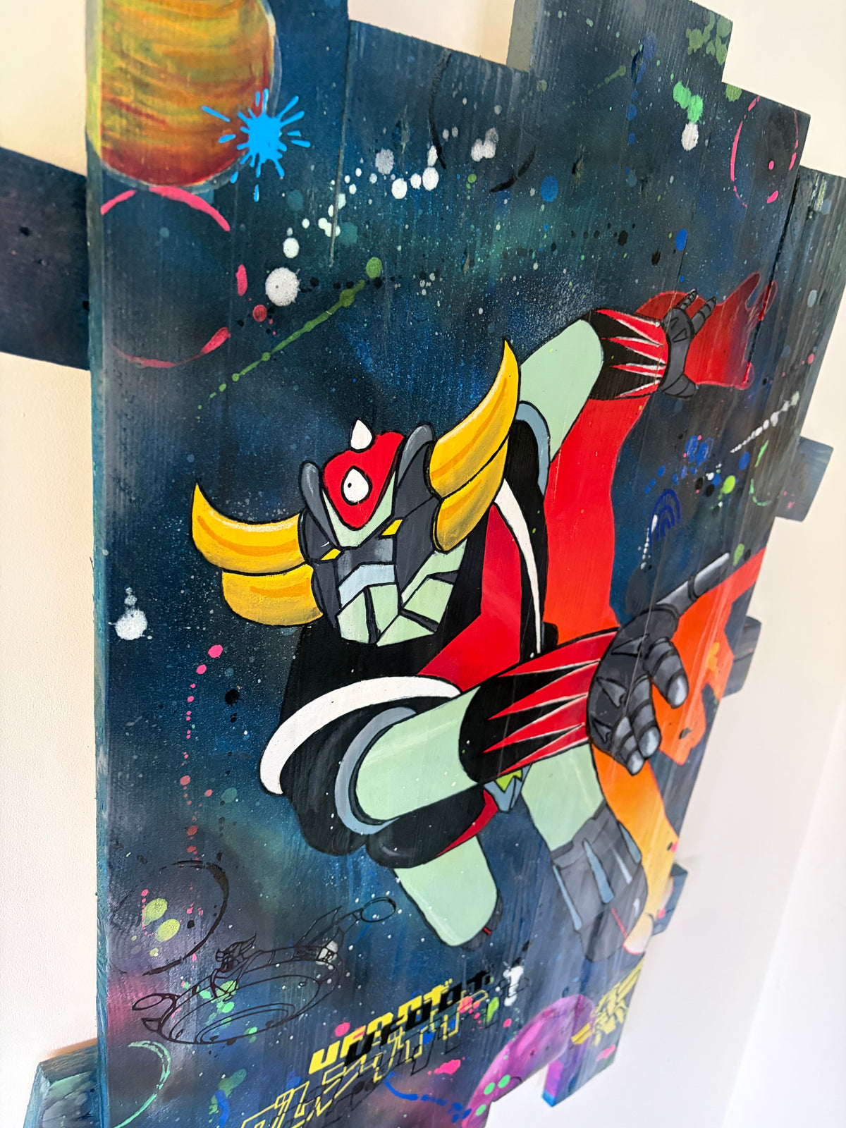 Tableau Goldorak 2026 de Vincent Streiff — vue rapprochée du personnage et de la base secrète