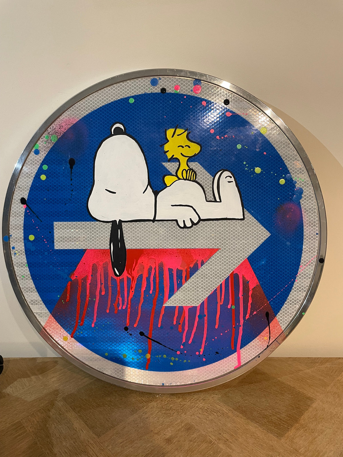 Panneau rond Snoopy et Woodstock — détail du visage de Snoopy