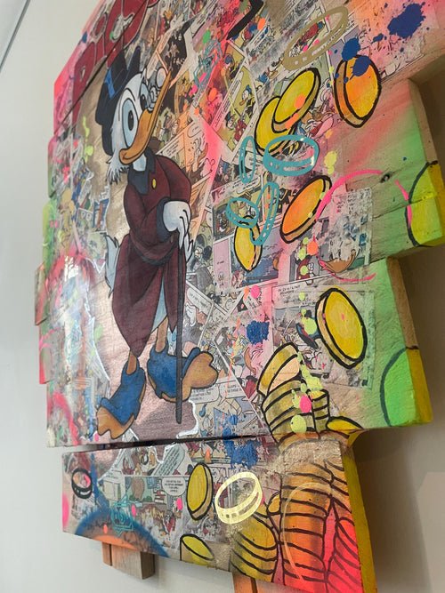 Tableau Picsou de Vincent Streiff — vue en angle montrant le relief du bois de palette recyclé